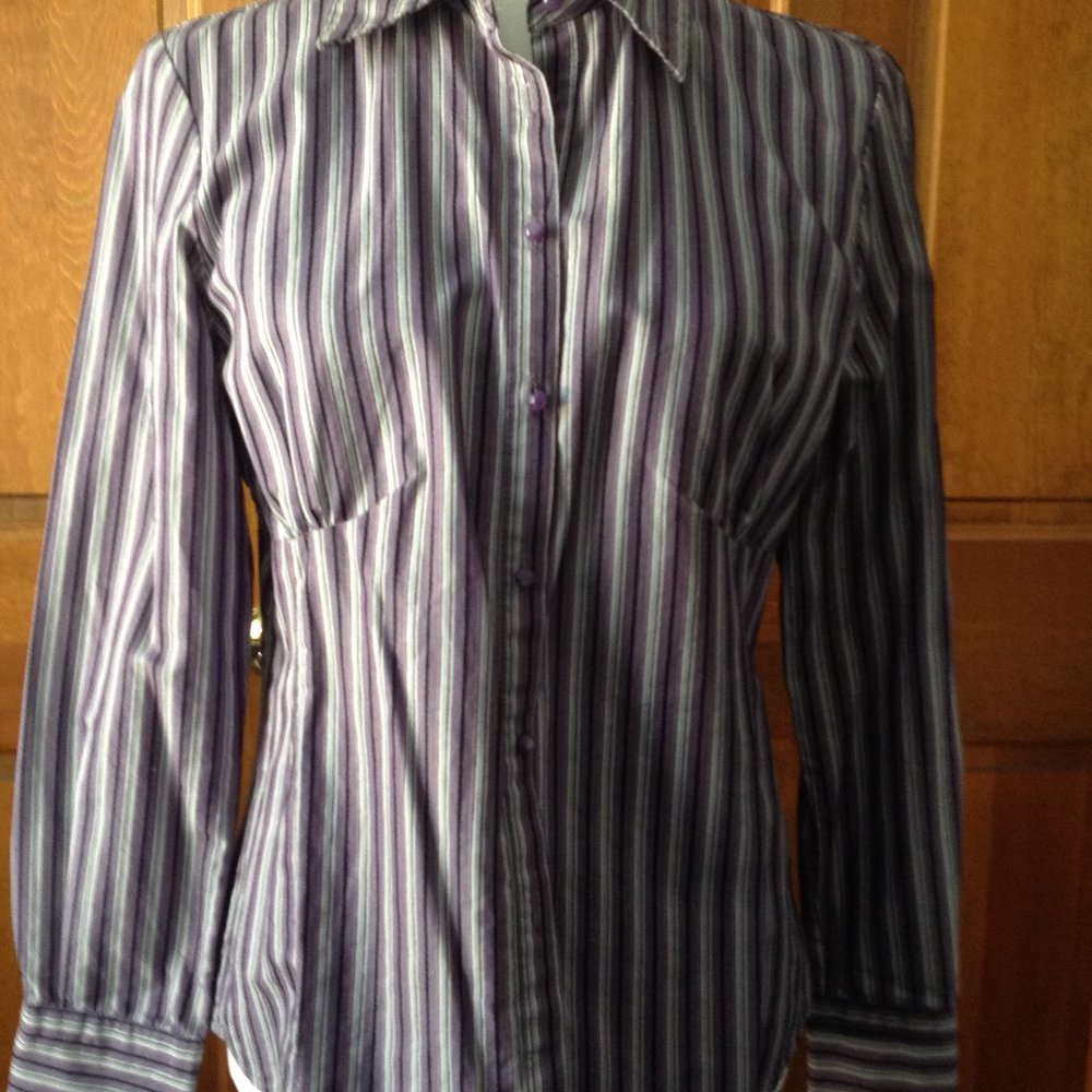 i.e. 100% Cotton Long Sleeved Stripped Blouse, fitted with buttoned cuffs, sz M